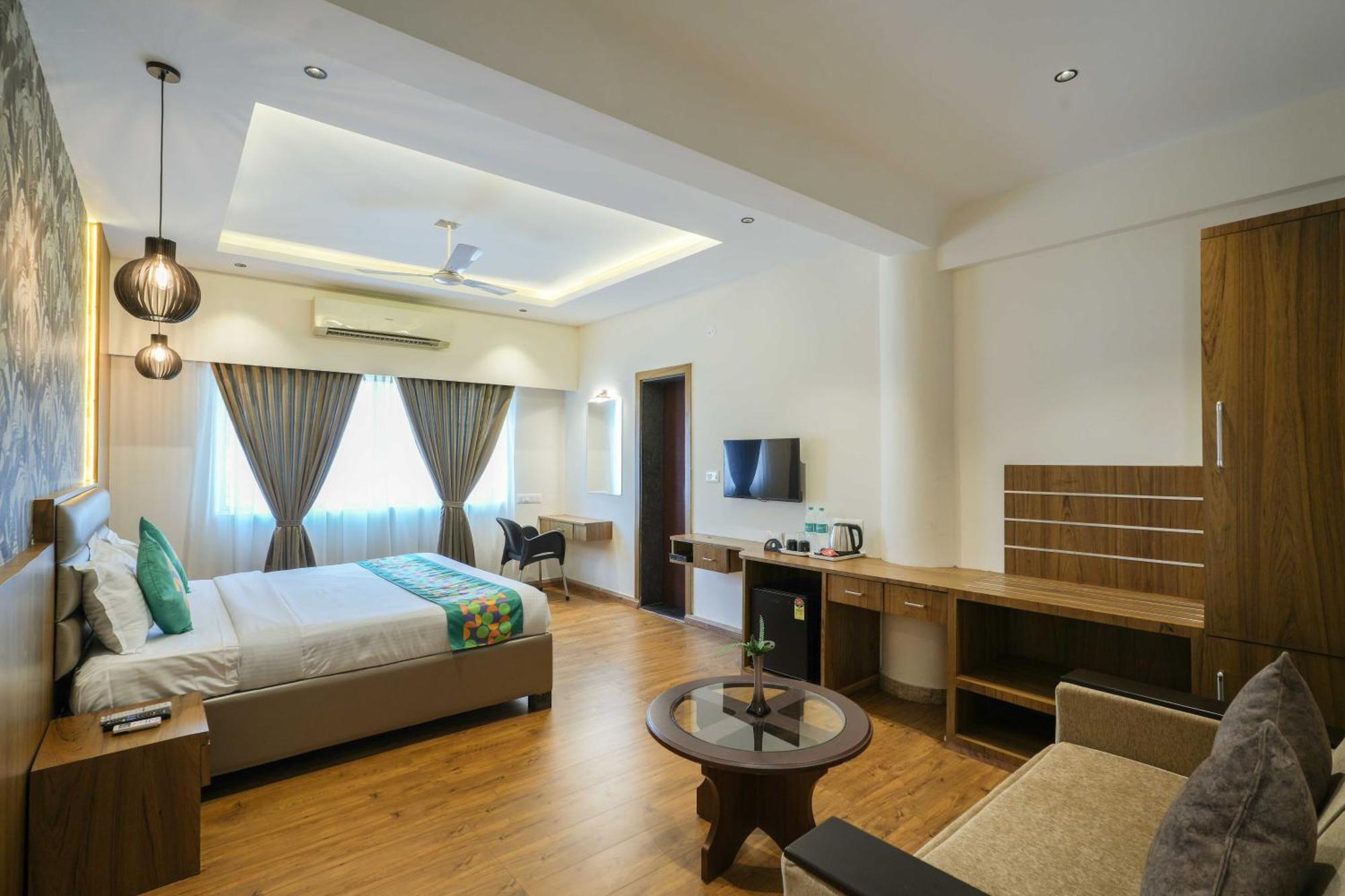 Treebo Pappilon Palace - Pvs Circle มังคาลอร์ ภายนอก รูปภาพ
