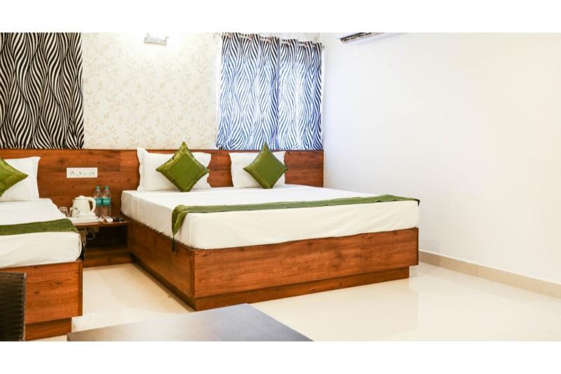 Treebo Pappilon Palace - Pvs Circle มังคาลอร์ ภายนอก รูปภาพ