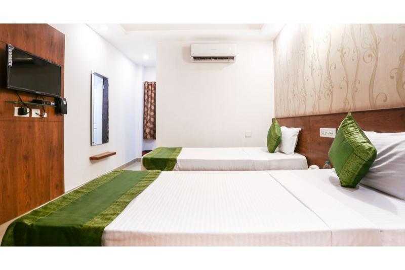Treebo Pappilon Palace - Pvs Circle มังคาลอร์ ภายนอก รูปภาพ